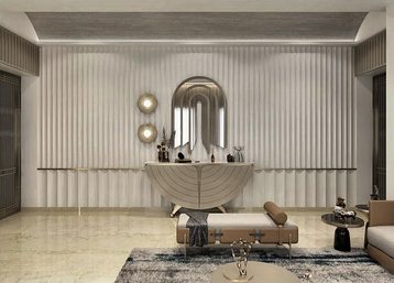 A sculptural console under an arched mirror, on a marble floor, with a bench to one side.